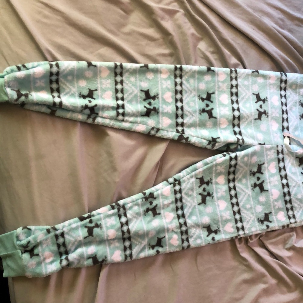 Soft light blue pajama pants with reindeer.